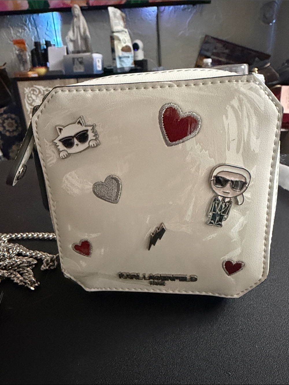 Karl Lagerfeld White Patent Mini Crossbody with Red & Silver Heart Accents